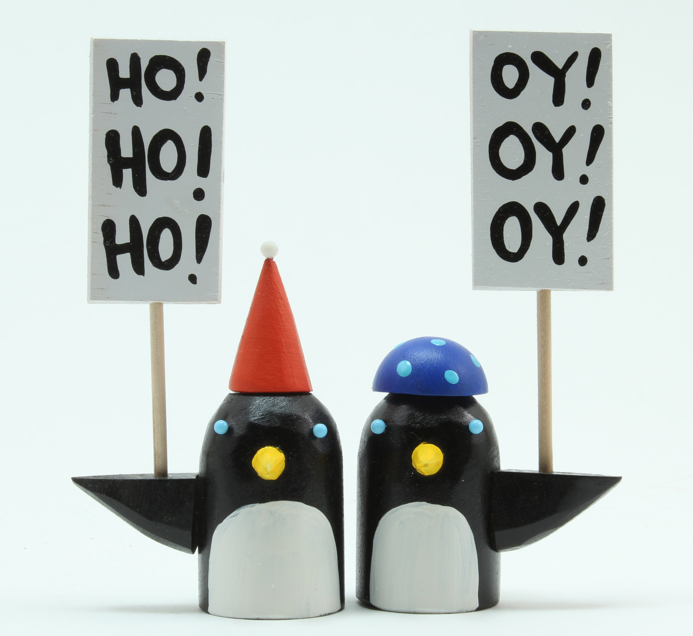 Picketing Penguin Partners by Bunny With A Toolbelt (Wood Sculpture